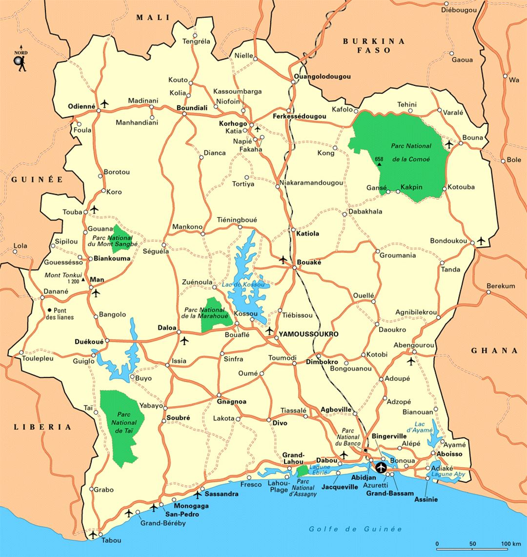 Detailed map of Cote d'Ivoire with roads, railroads, cities, airports and national parks